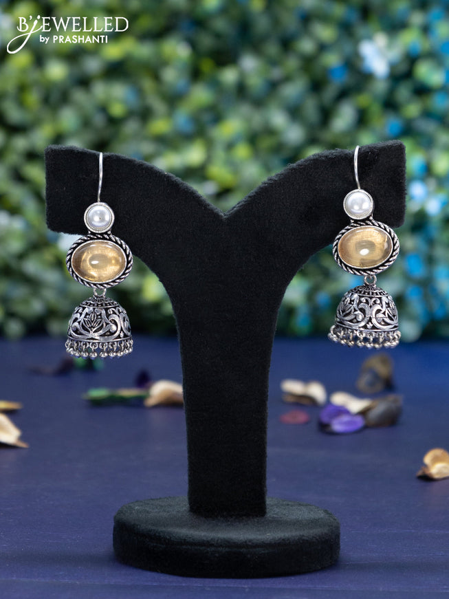 Oxidised hanging type jhumka with sandal stones and hangings