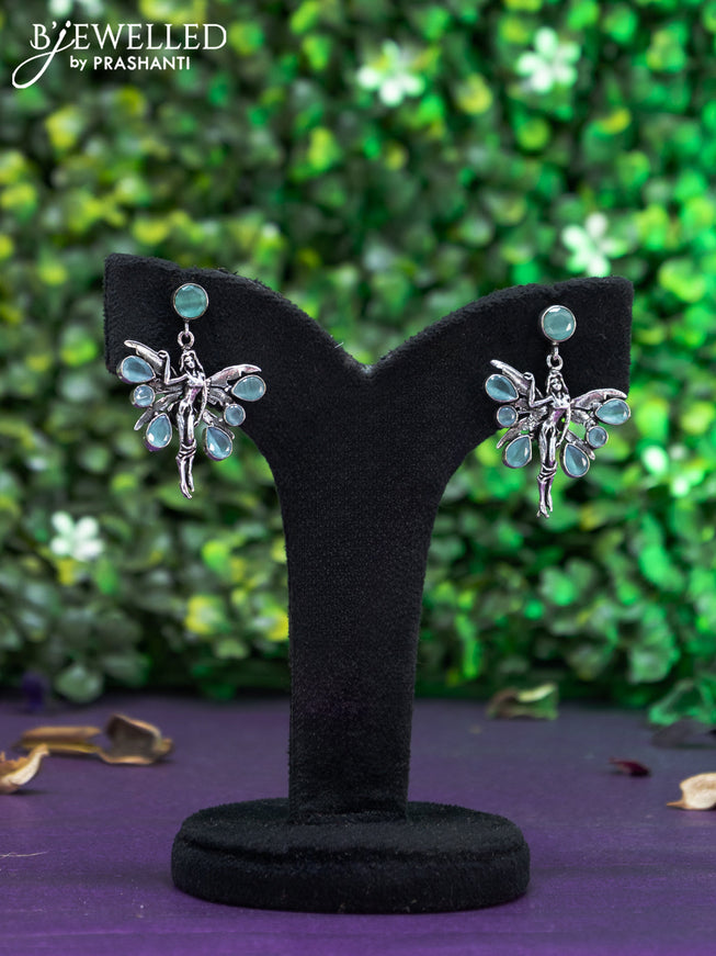 Oxidised earring butterfly design with mint green stones