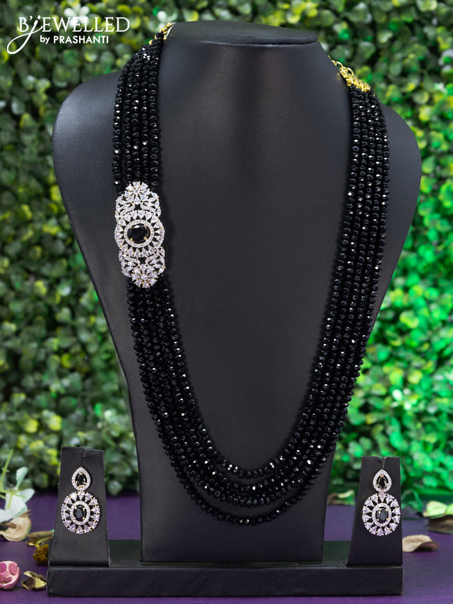 Crystal black beaded necklace with cz & black stone and side pendant