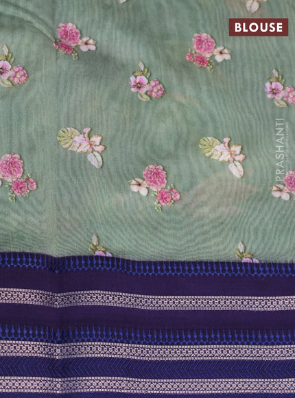 Maheshwari silk cotton saree psastel green and blue with allover floral prints and thread & zari woven border