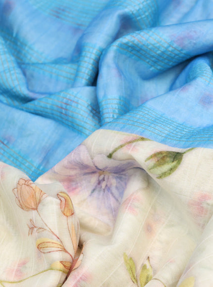 Maheshwari silk cotton saree cream and light blue with allover floral prints and thread & zari woven border