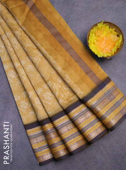 Maheshwari silk cotton saree mustard yellow and blue with allover floral prints and thread & zari woven border