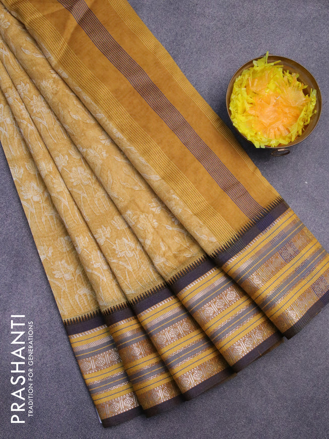 Maheshwari silk cotton saree mustard yellow and blue with allover floral prints and thread & zari woven border