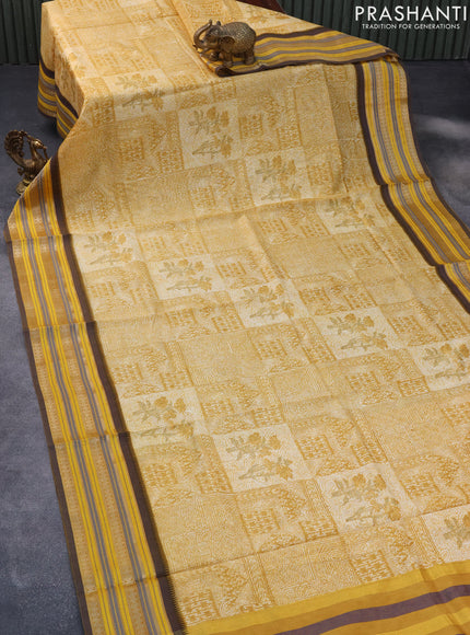 Maheshwari silk cotton saree mustard yellow and dark blue with floral prints and thread & zari woven border