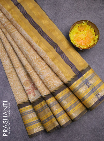 Maheshwari silk cotton saree mustard shade with floral prints and thread & zari woven border