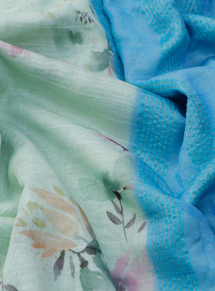 Maheshwari silk cotton saree pastel green and light blue with allover floral prints and thread & zari woven border