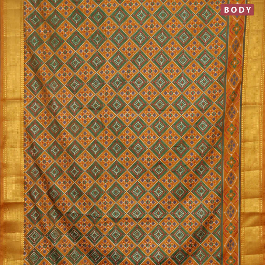 Semi tussar saree mustard yellow and green with allover ikat prints and zari woven border