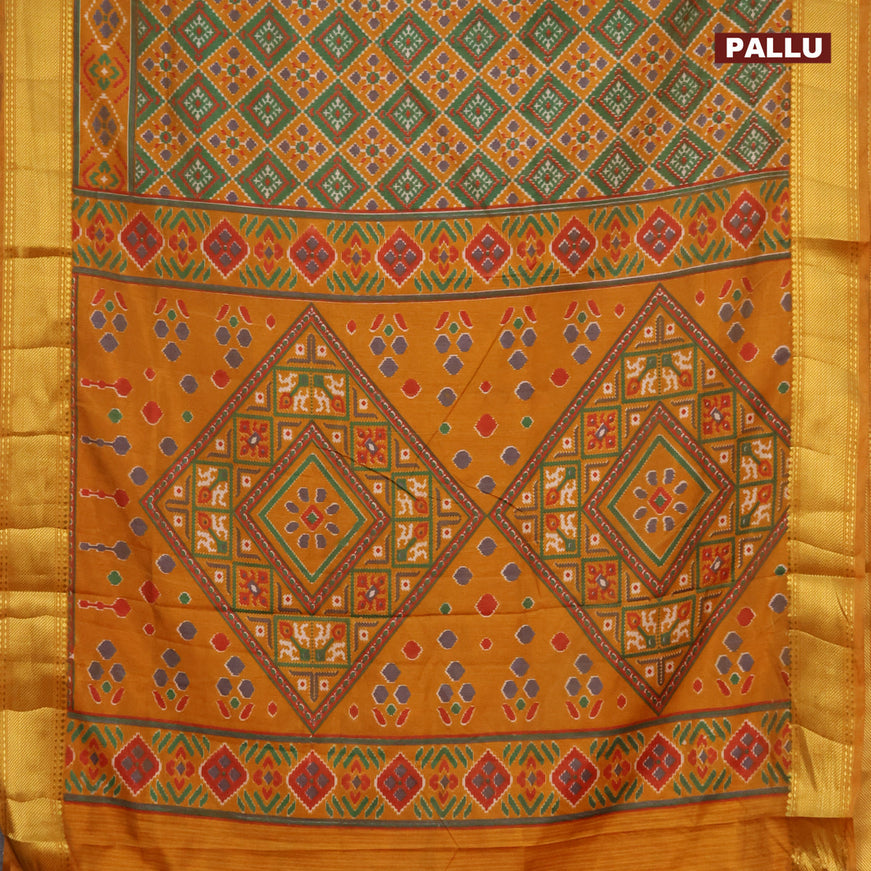 Semi tussar saree mustard yellow and green with allover ikat prints and zari woven border