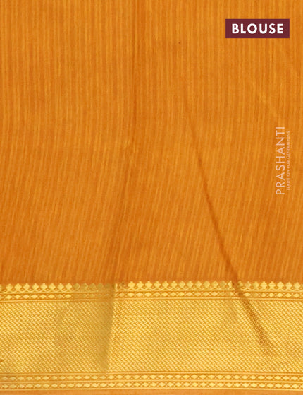 Semi tussar saree mustard yellow and green with allover ikat prints and zari woven border