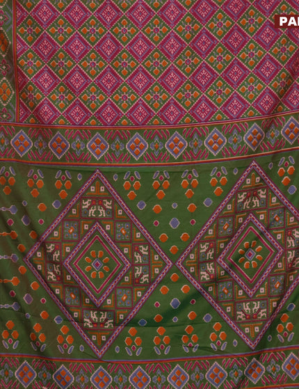 Semi tussar saree dark magenta pink green and maroon with allover ikat prints and zari woven border