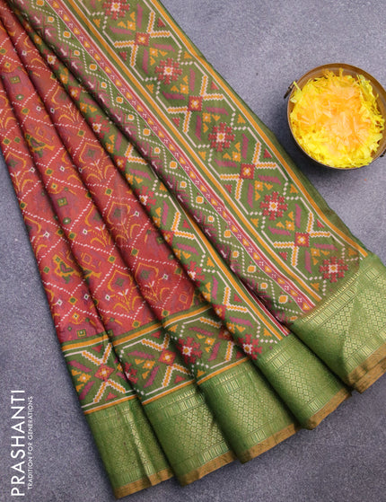 Semi tussar saree rust shade and green shade with allover ikat prints and zari woven border