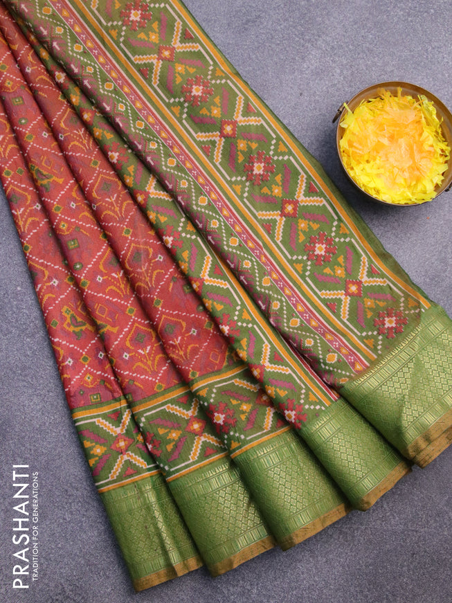 Semi tussar saree rust shade and green shade with allover ikat prints and zari woven border