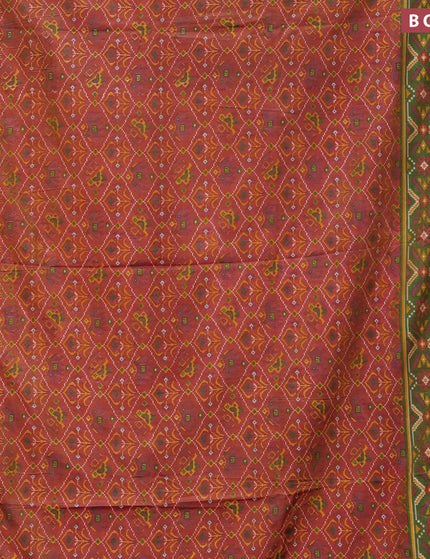 Semi tussar saree rust shade and green shade with allover ikat prints and zari woven border