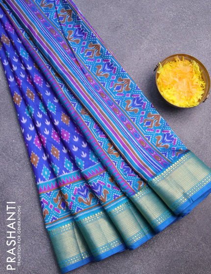 Semi tussar saree blue and cs blue with ikat butta weaves and zari woven border