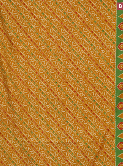 Semi tussar saree mustard yellow and green with allover ikat prints and zari woven border