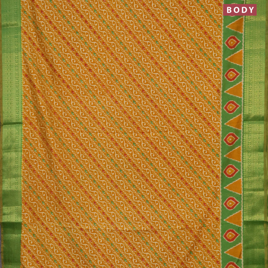 Semi tussar saree mustard yellow and green with allover ikat prints and zari woven border