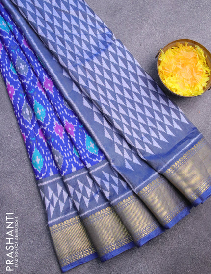 Semi tussar saree blue with allover ikat prints and zari woven border