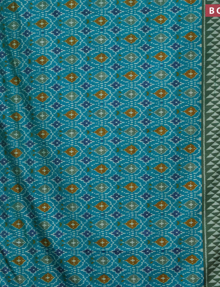 Semi tussar saree teal green and green with allover ikat prints and zari woven border