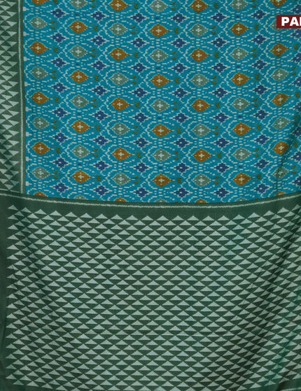 Semi tussar saree teal green and green with allover ikat prints and zari woven border