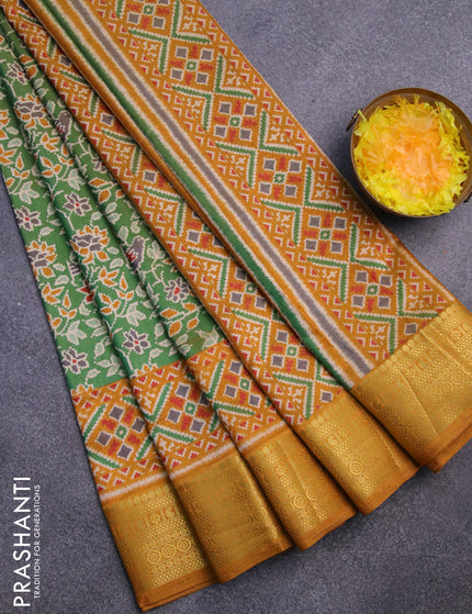 Semi tussar saree green and mustard shade with allover ikat prints and zari woven border