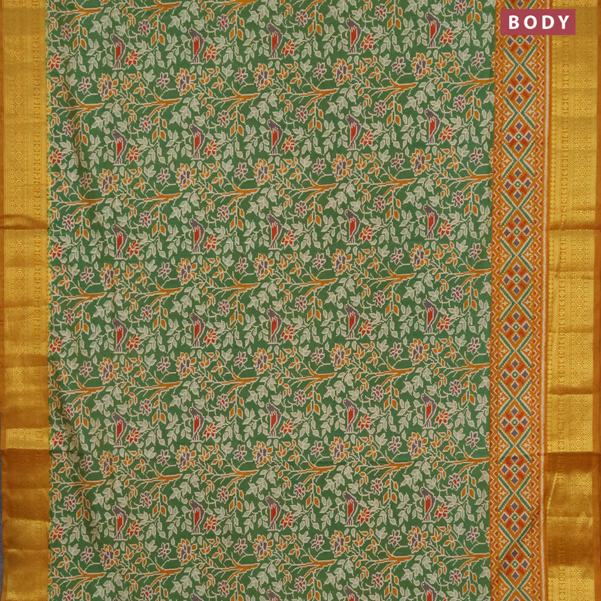 Semi tussar saree green and mustard shade with allover ikat prints and zari woven border