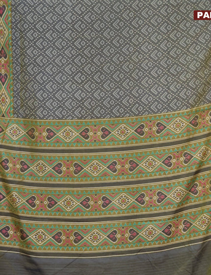 Semi tussar saree dual shade of greyish green and elaichi green with allover ikat prints and zari woven border