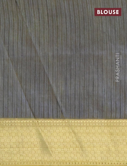 Semi tussar saree dual shade of greyish green and elaichi green with allover ikat prints and zari woven border