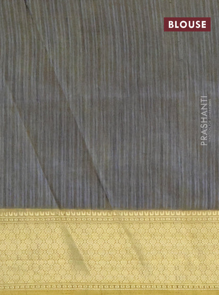 Semi tussar saree dual shade of greyish green and elaichi green with allover ikat prints and zari woven border