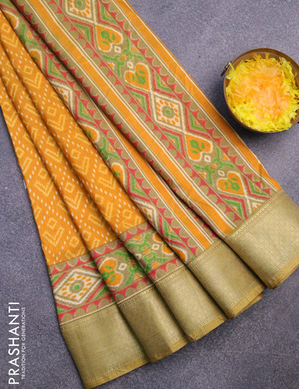 Semi tussar saree mustard yellow and elaichi green with allover ikat prints and zari woven border