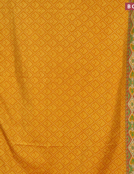 Semi tussar saree mustard yellow and elaichi green with allover ikat prints and zari woven border