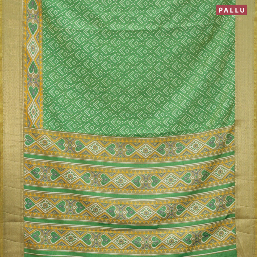 Semi tussar saree green shade with allover ikat prints and zari woven border