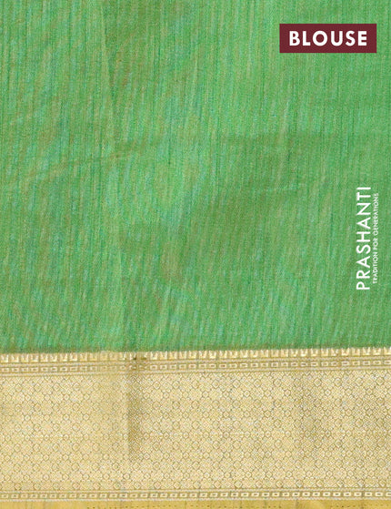 Semi tussar saree green shade with allover ikat prints and zari woven border