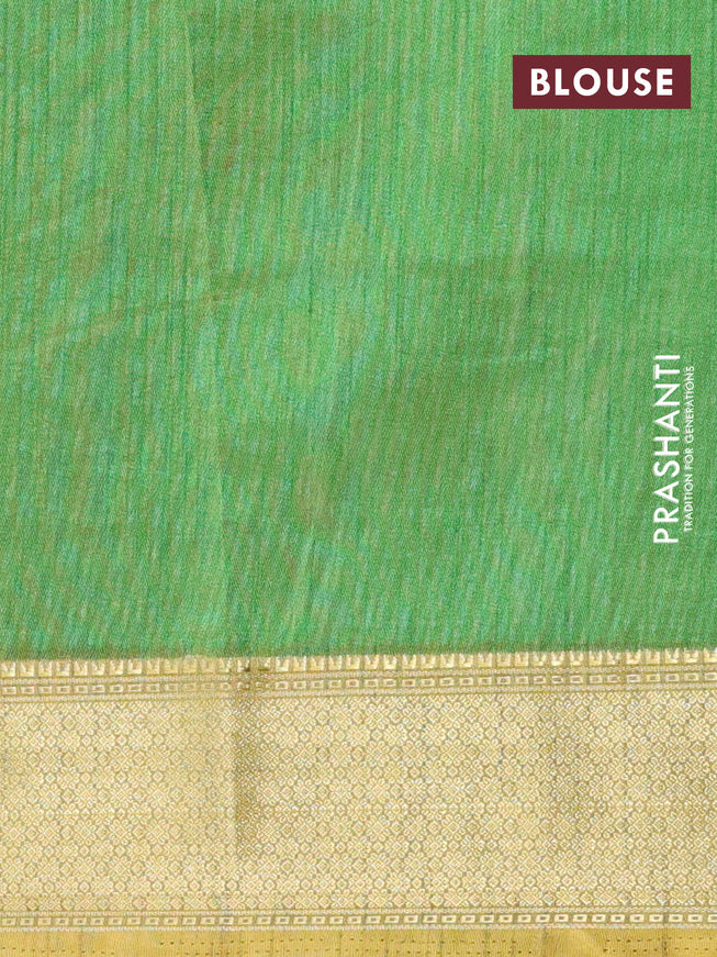 Semi tussar saree green shade with allover ikat prints and zari woven border