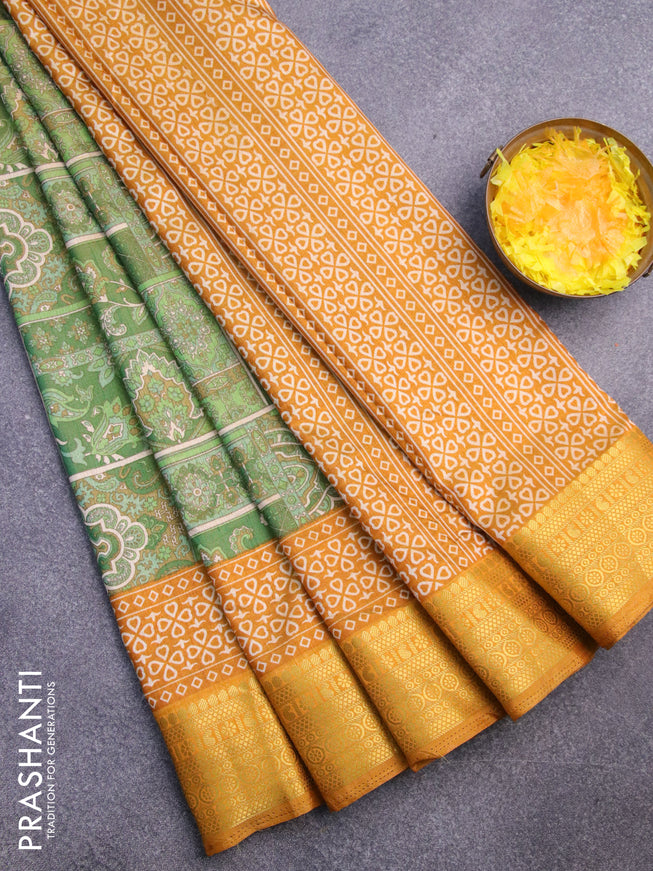 Semi tussar saree green shade and mustard shade with allover ikat prints and zari woven border