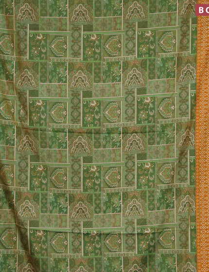 Semi tussar saree green shade and mustard shade with allover ikat prints and zari woven border