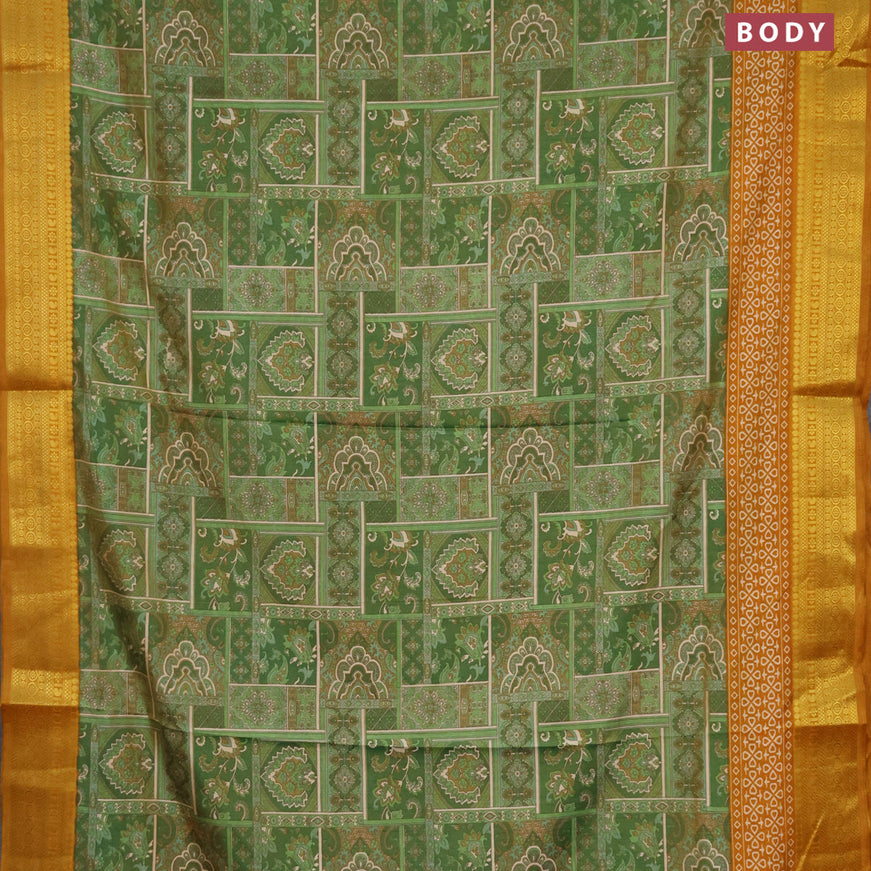 Semi tussar saree green shade and mustard shade with allover ikat prints and zari woven border