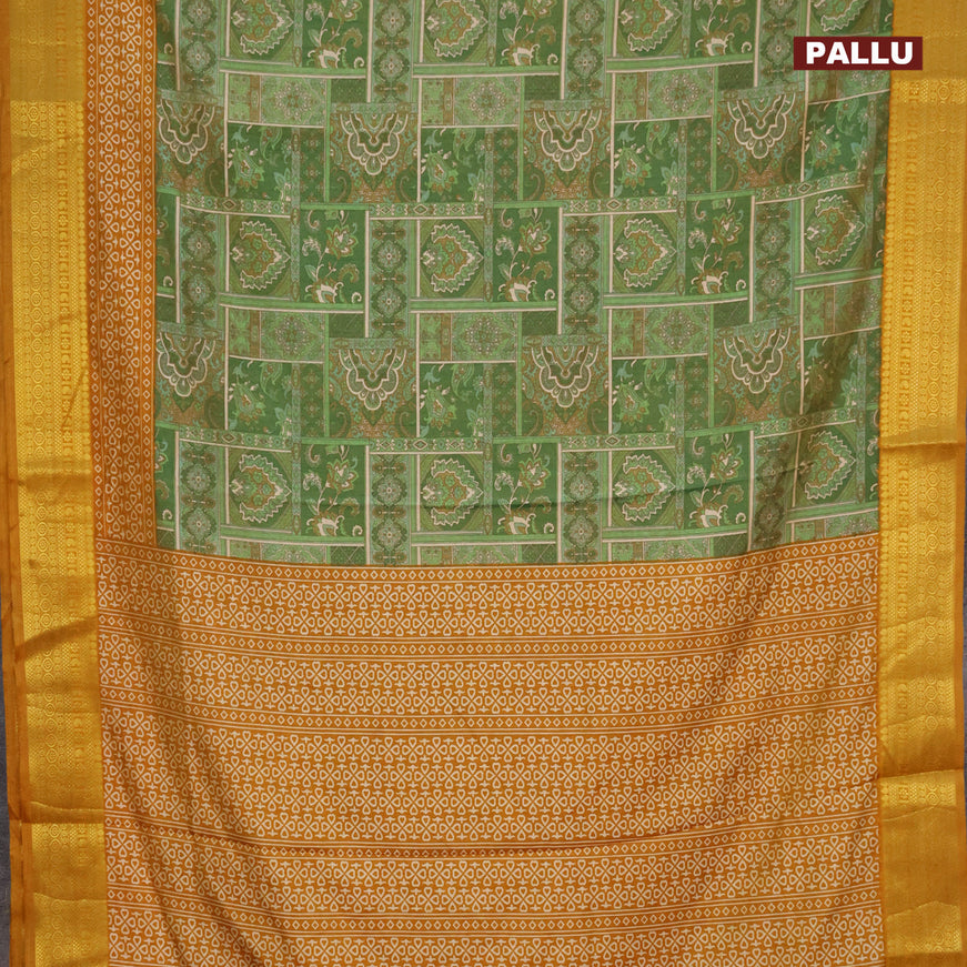 Semi tussar saree green shade and mustard shade with allover ikat prints and zari woven border