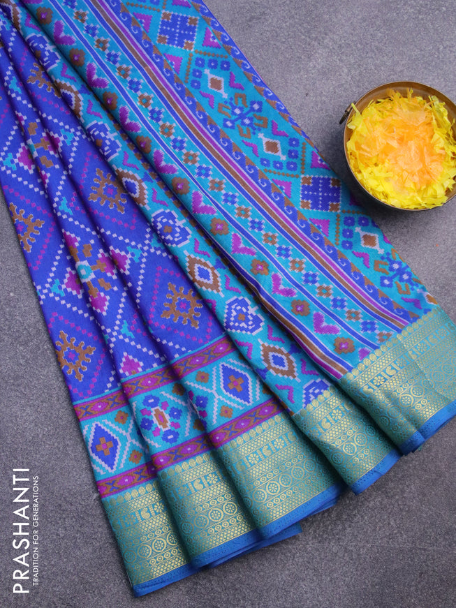 Semi tussar saree blue and cs blue with allover ikat prints and zari woven border