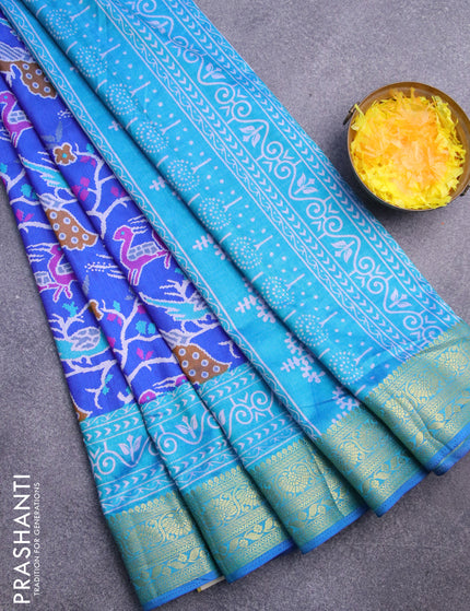 Semi tussar saree royal blue and teal blue with allover ikat prints and zari woven border