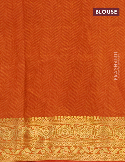 Semi tussar saree pink and mustard shade with allover ikat prints and zari woven border