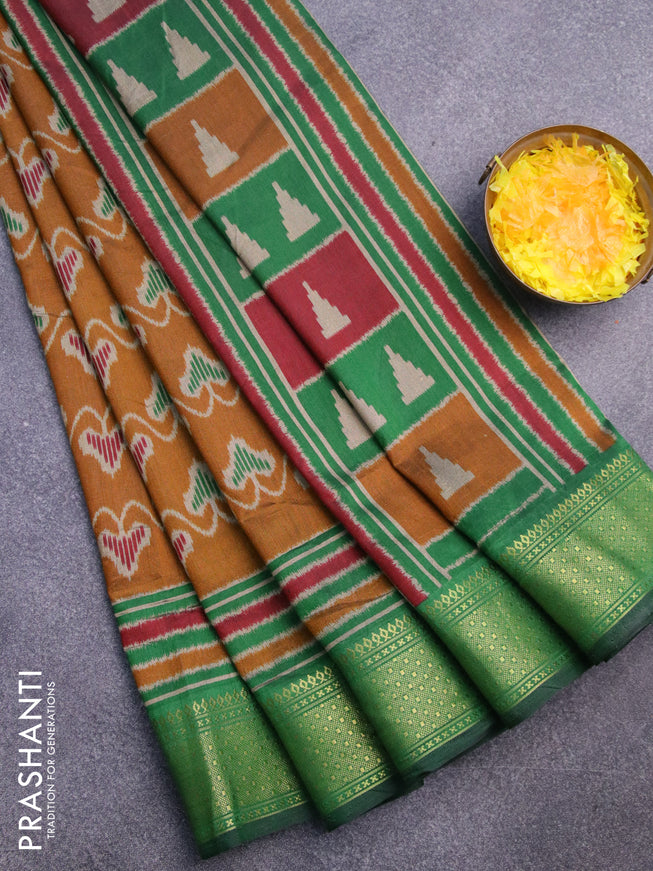 Semi tussar saree mustard shade and green with allover ikat prints and zari woven border