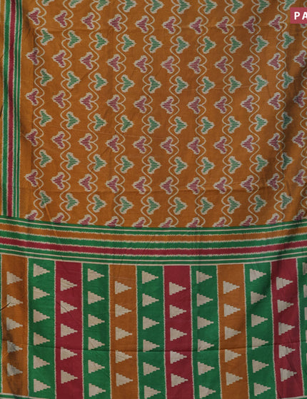 Semi tussar saree mustard shade and green with allover ikat prints and zari woven border