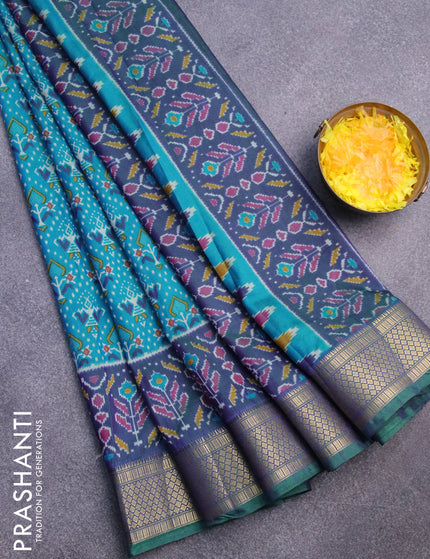 Semi tussar saree teal blue and dual shade of bluish green with allover ikat prints and zari woven border