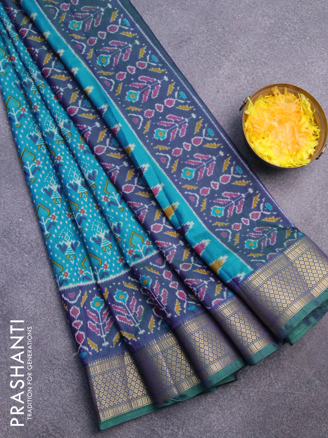 Semi tussar saree teal blue and dual shade of bluish green with allover ikat prints and zari woven border