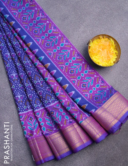 Semi tussar saree blue and purple with allover ikat prints and zari woven border