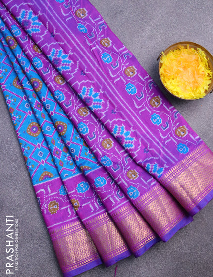 Semi tussar saree cs blue and purple with allover ikat prints and zari woven border