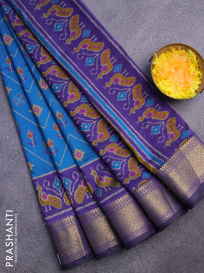 Semi tussar saree cs blue and dark blue with allover ikat prints and zari woven border