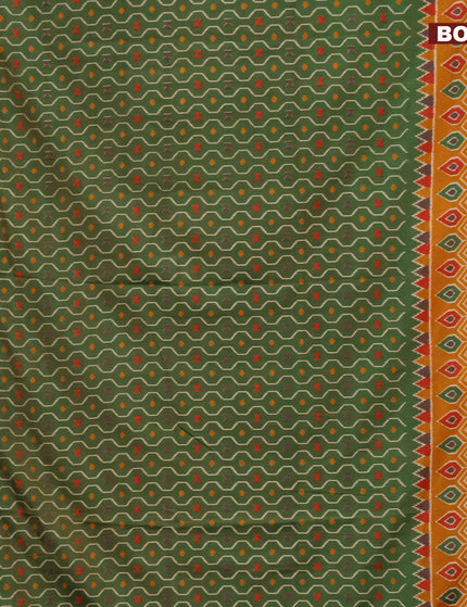 Semi tussar saree green shade and mustard shade with allover prints and zari woven border