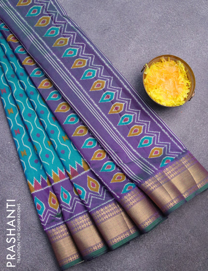 Semi tussar saree teal blue and dual shade of purple with allover prints and zari woven border