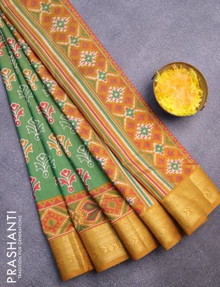 Semi tussar saree green and mustard shade with butta prints and zari woven border